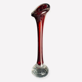 A vintage red Aseda Glasbruk Swedish art glass bullicante bud vase with a polished base, designed by Bo Bergstrom.