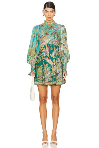 Fitted mini dress silhouette
Stand collar
Loop and button closure at centre back
Open back detail
Invisible zip at centre back of skirt
Balloon sleeve with flounce cuff and buttons