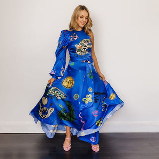 Model wearing the blue Alemais Soleil Hire Dress 