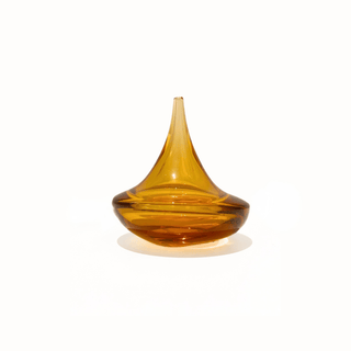 Amber glass vase on a white background