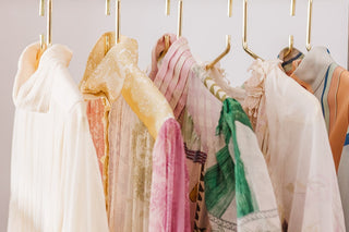 Designer Dresses for Hire on a Dress Hire garment rack